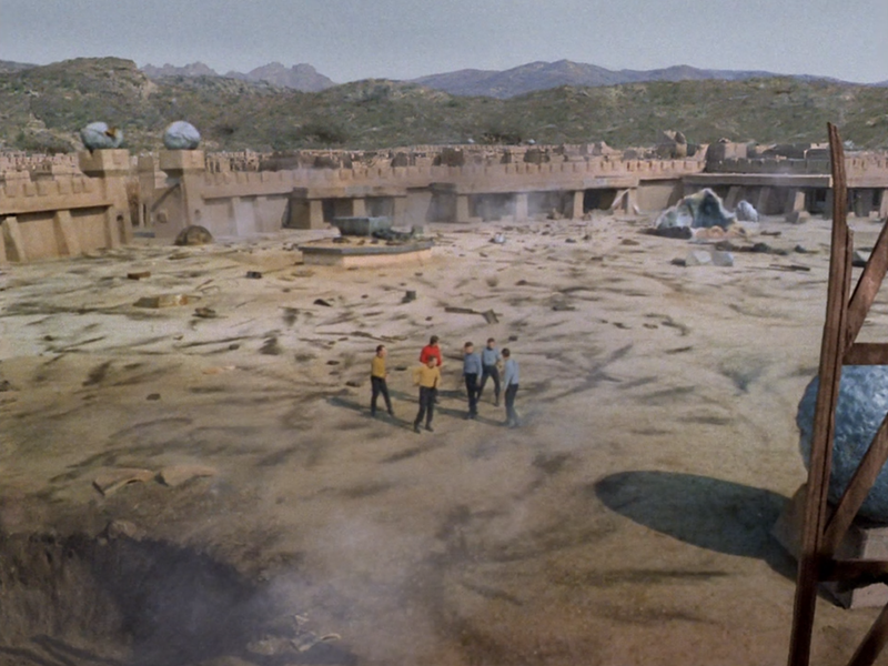The Enterprise landing party finds the Cestus III outpost in ruins.